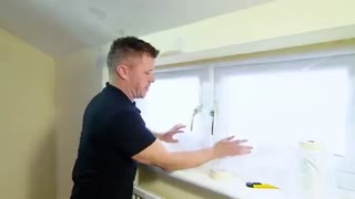 پوشاندن کلید و پنجره قبل از نقاشی ساختمان با رنگ پاش