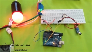 روشن و خاموش کردن لامپ 220 با بشکن زدن
