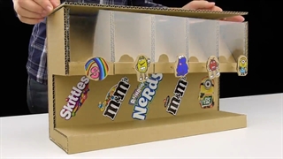 smart girl shows how to build candy dispenser